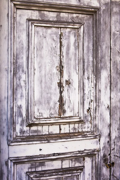 Textura da porta cinza angustiada — Fotografia de Stock
