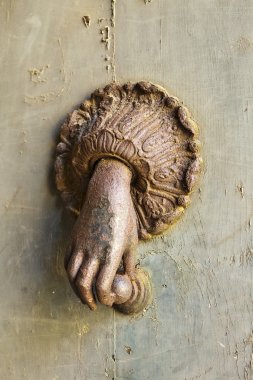 Rusted Hand Door Knocker clipart