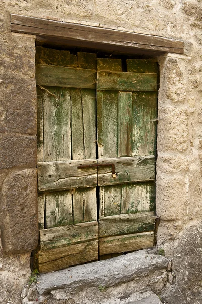 Drzwi do piwnicy drewna zielony — Zdjęcie stockowe