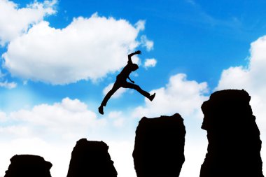 Man jumping off obstacles to the top clipart