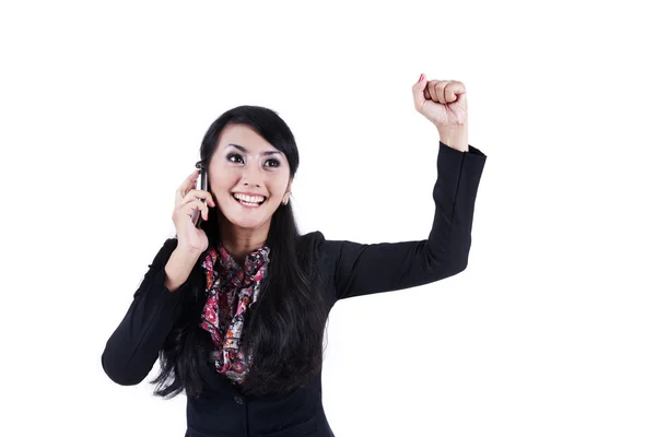 Elated businesswoman using cell phone — Stock Photo, Image