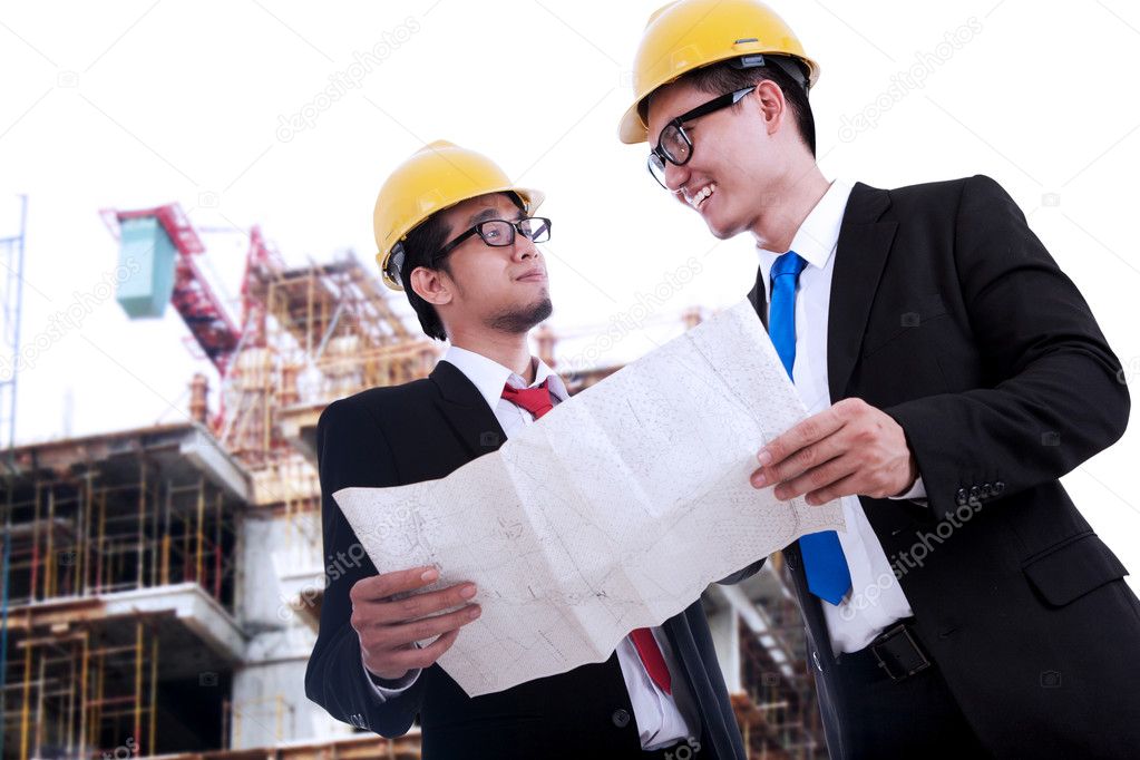 Architects Reviewing Blueprint