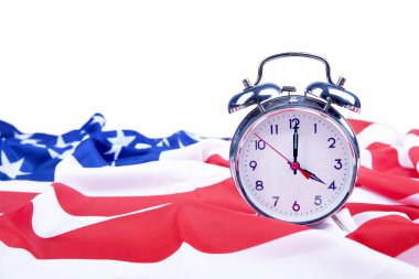 American flag and alarm clock isolated on white clipart