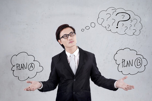 Asian businessman doubtful