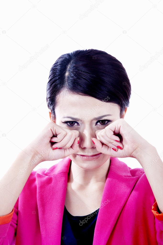 Businesswoman crying isolated on white