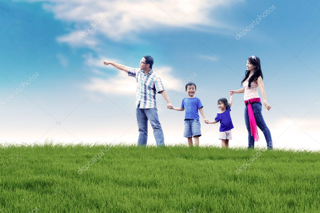 Asian Family Having Fun Outdoor