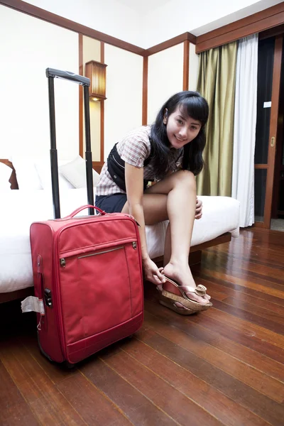 stock image Asian woman in a hotel room