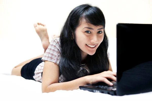 Cute Asian Woman Working in Bedroom — Stock Photo, Image