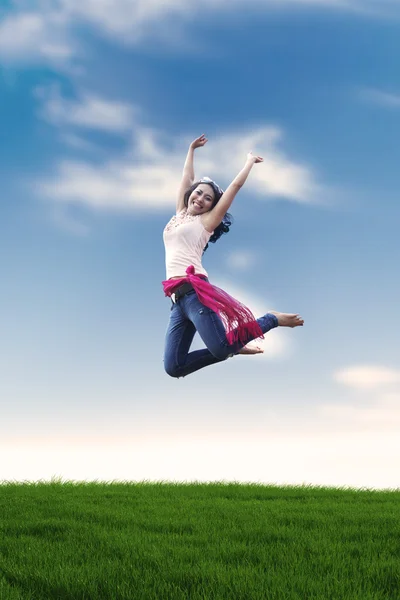 Excited Asian woman jumping — Stock Photo, Image