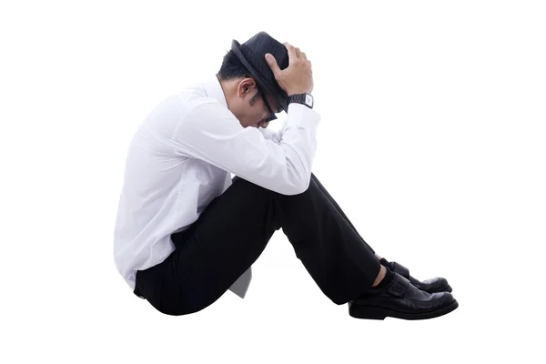 stock image Unhappy Asian businessman with fedora