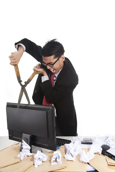 Mad Businessman with Grass Shear in his office — Stock Photo, Image