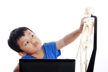 Little boy learns human anatomy clipart