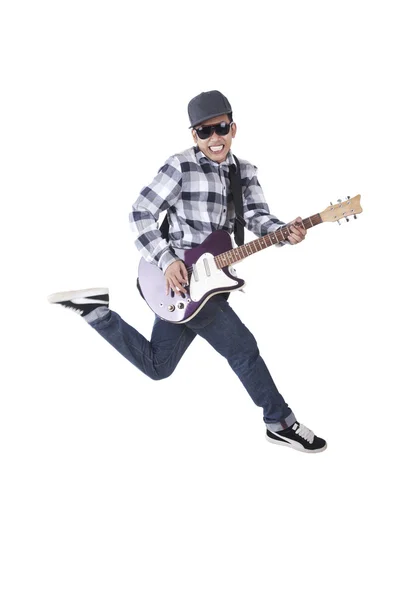 Asian guy with guitar jumping — Stock Photo, Image