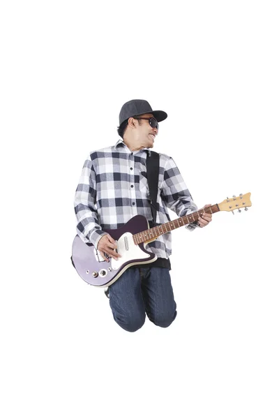 Energético asiático chico juega guitarra —  Fotos de Stock