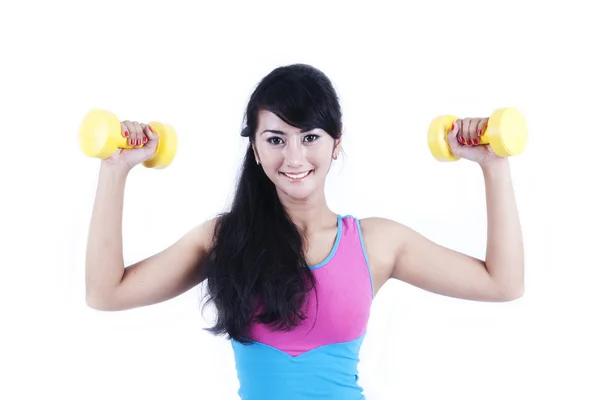 Asian woman working out with dumbell — Stock Photo, Image