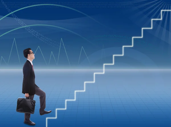 Businessman climbs stairways — Stock Photo, Image