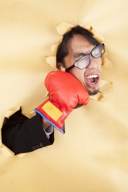 Businessman gets punch on his face clipart