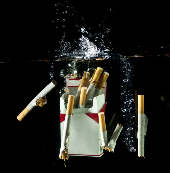 Cgarets splash — Stockfoto
