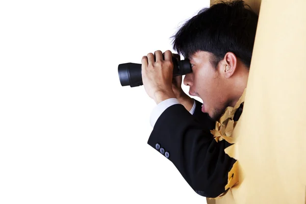 Šokovaný podnikatel s dalekohledem — Stock fotografie