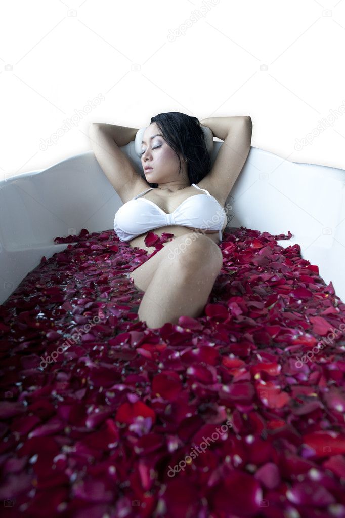 Sexy Asian woman having a bath