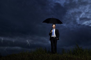 Businessman with thunderstorm clipart