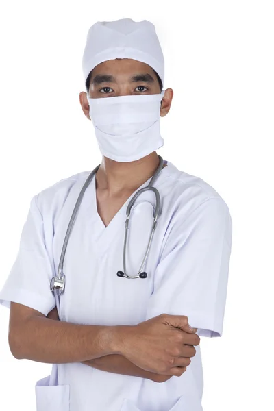 Omtänksamma läkare bär mask Stockbild