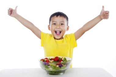 Healthy child with salad clipart