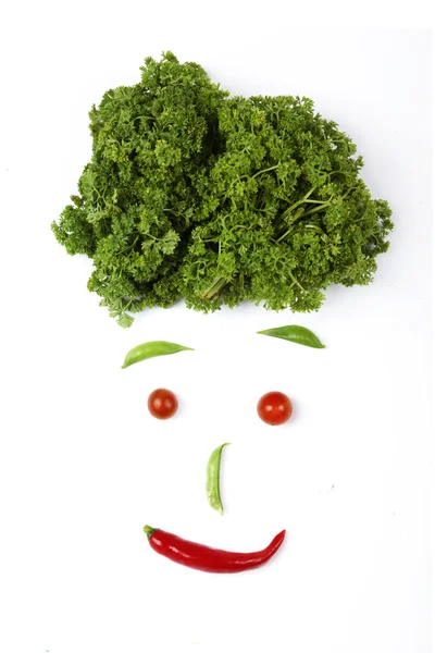 Gesicht aus unterschiedlichem Gemüse — Stockfoto