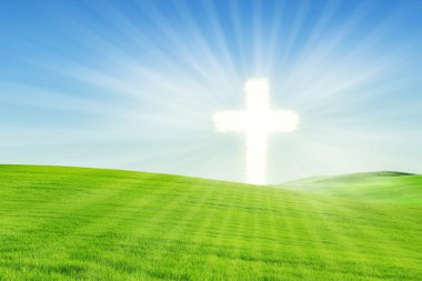 Christian background: Glowing Cross in Spring clipart