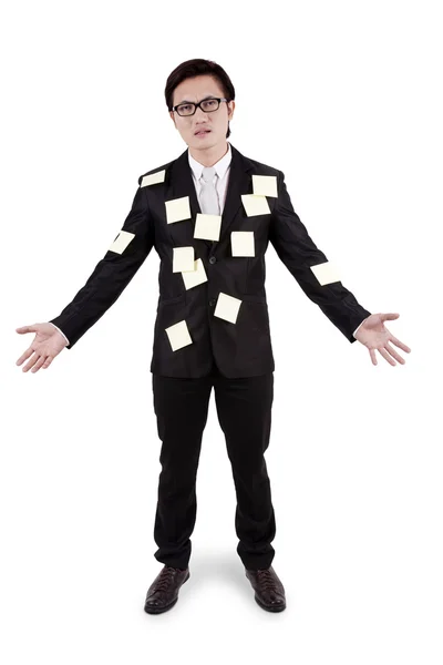 Businessman with sticky note — Stock Photo, Image