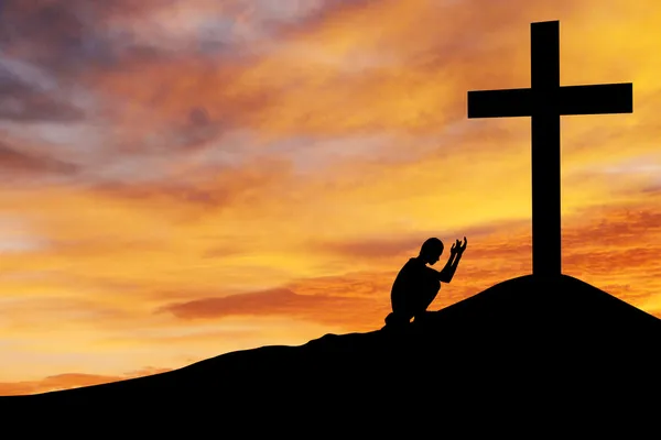 Člověk se modlí pod kříž — Stock fotografie