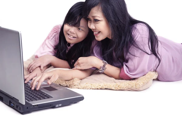 stock image Happy asian family on a laptop