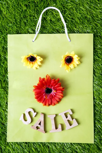 Sale Shopping bag with flowers — Stock Photo, Image
