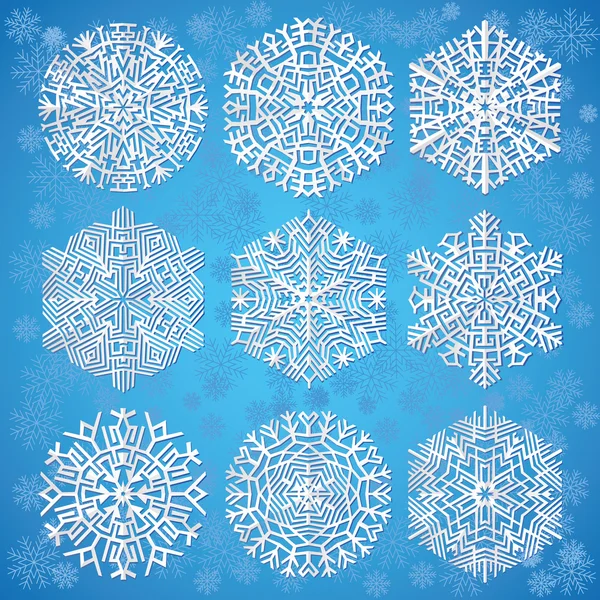 Copos de nieve sobre fondo azul — Archivo Imágenes Vectoriales
