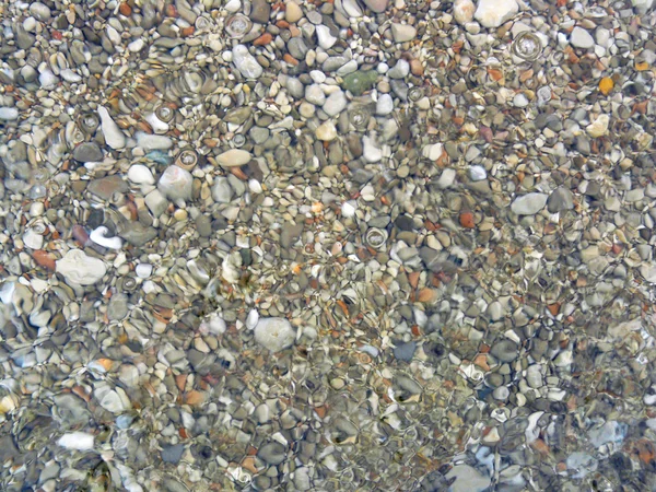 Sea pebbles under water — Stock Photo, Image