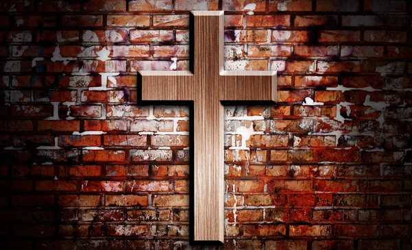 Trä krucifixet på tegel vägg belysning av spotlight — Stockfoto