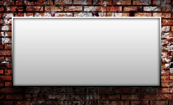 Sinlge blank on a brick wall — Stock Photo, Image