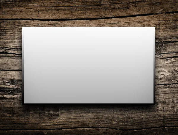 Three blank on a wood background — Stock Photo, Image