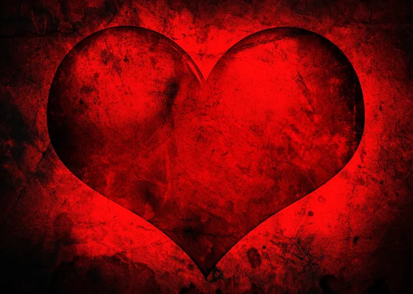 Червоне серце гранжевий фон — стокове фото