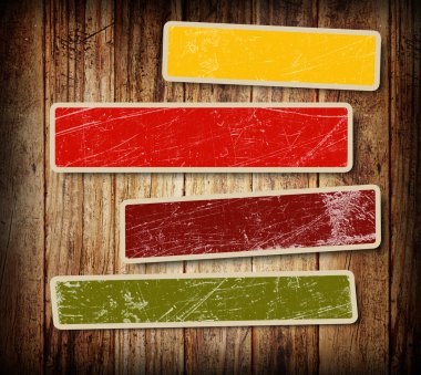 Background with colorful boxes for text on wood background clipart