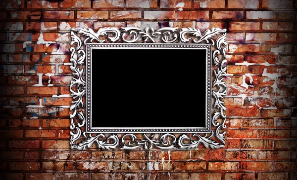 Vintage silver frame on the wall — Stock Photo, Image
