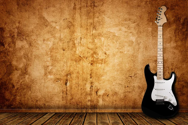 Elektrická kytara a zeď — Stock fotografie