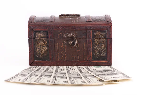 Wooden chest with money isolated on white background — Stock Photo, Image
