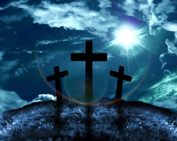 Silhouette de trois croix sur une colline — Photo