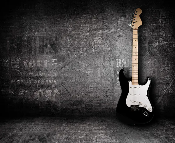 Guitarra elétrica e a parede — Fotografia de Stock