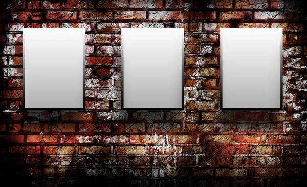 Three blank on a brick wall — Stock Photo, Image