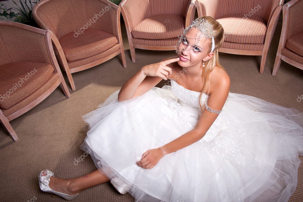 Bride seated on the floor