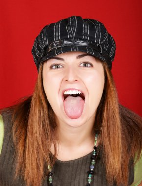 Young girl sticking out her tongue clipart