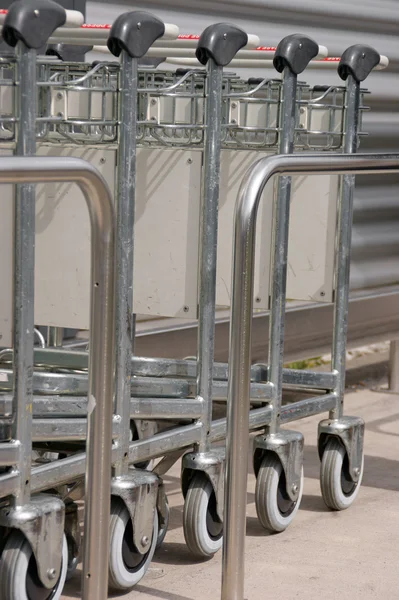 stock image Raw of luggage carts at the airport