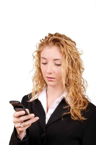 Stock image Businesswoman text messaging on mobile